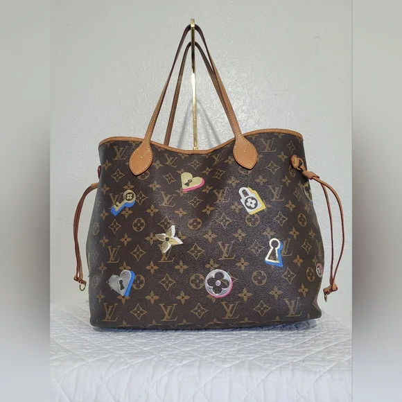 Louis Vuitton Brown Monogram Neverfull Tote with Decorative Patch Accents - Picture 1 of 16